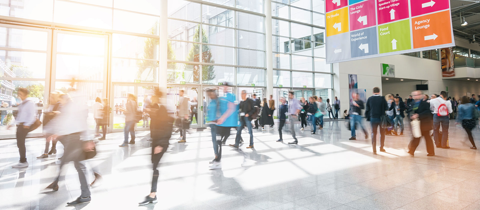 Visitors at a trade show hall